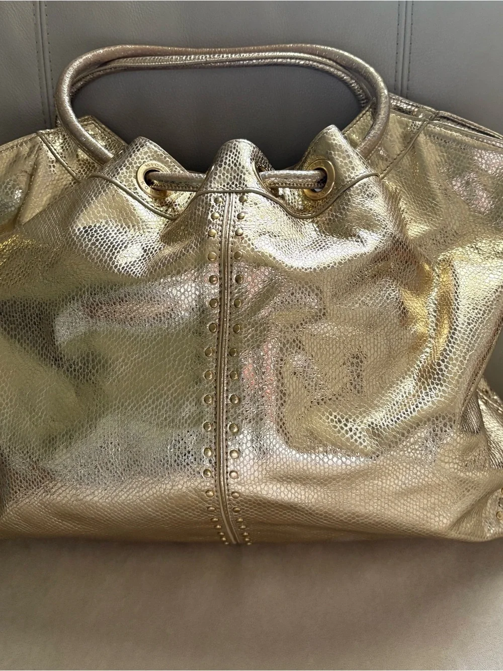 Michael Kors Metallic Gold Studded Drawstring Hobo